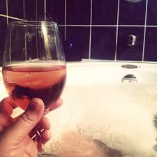 coffee and weight loss glass of wine in a tub with bubbles